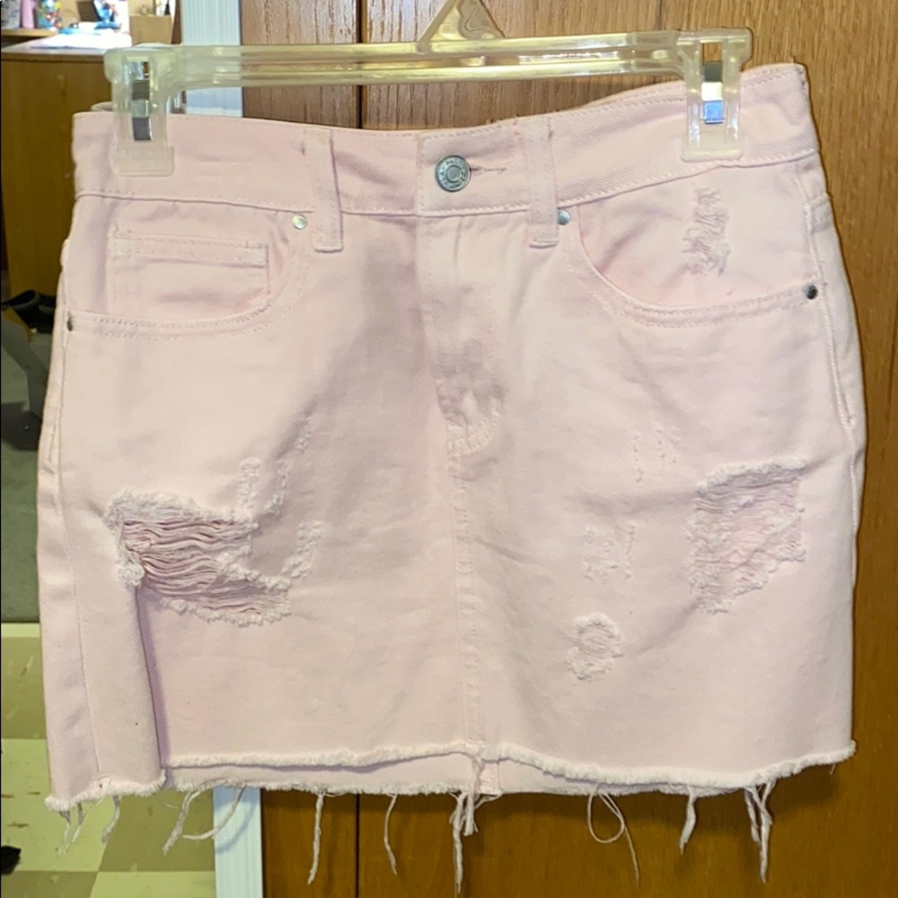 Never worn Light pink ripped denim skirt